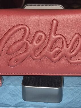 bebe Red Embossed Logo Clutch